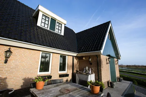 Buitenschilderwerk vrijstaande woning Kalverringdijk, Zaandam Buitenschilderwerk vrijstaande woning Kalverringdijk, Zaandam