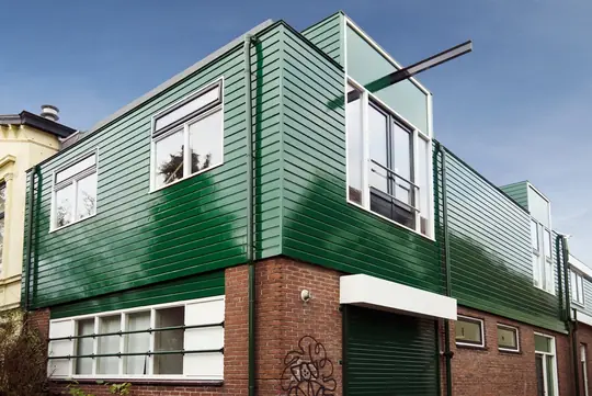 En we voerden ook al eerder schilderwerk uit voor Zaansprint - Buitenschilderwerk bedrijfspand Zaansprint