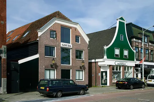 Gehele buitenschilderwerk voormalig houten kaaspakhuis "Gouda" (Zaanweg, Wormerveer) - foto 1